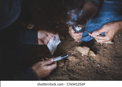 substance abuse, addiction and bad habits concept.  Young people smoking cigarettes and using drugs. Stop drug addiction concept.  International Day against Drug Abuse. 