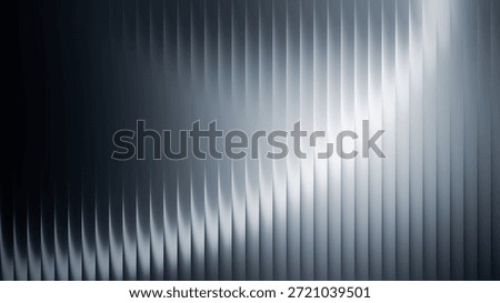Subtle abstract image featuring a gradient pattern of vertical lines forming a wave effect. The gray tones create a sophisticated visual impact.