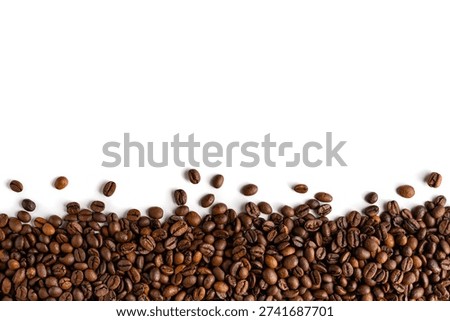 Subtle horizontal border made of randomly spread coffee beans on white background for footer design and menu decoration.