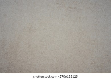 subtle light beige surface background texture with faint grain and mottled appearance concept of ceramic tile, minimalist decor, neutral paper. 