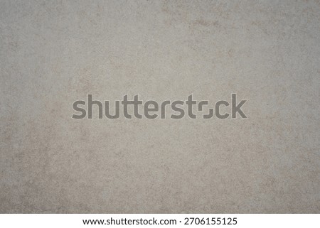 subtle light beige surface background texture with faint grain and mottled appearance concept of ceramic tile, minimalist decor, neutral paper. 