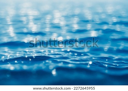 The subtle movements of the water surface with bubble and bokeh