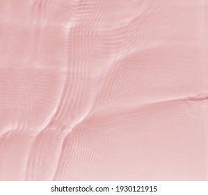 Subtle Pink Texture Of Light-shadow Pattern Of Sunlight Reflection From Rippled Water Surface. Beautiful Natural Pattern With 3D Feeling. 