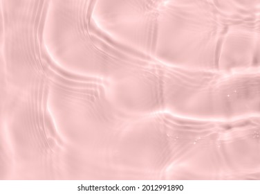 Subtle Pink Texture Of Light-shadow Pattern Of Sunlight Reflection From Rippled Water Surface. Beautiful Natural Pattern With 3D Feeling. 