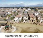 Suburban Arizona community shot from high vantage point looking down onto a housing development