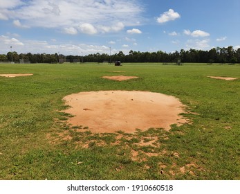 Suburban Baseball And Softball Field Dirt Diamond And Second Base, Greem Grass, Blue Sky White Clouds, Lawn Mower, Surveyors Creek, Glenmore Park, NSW, Australia