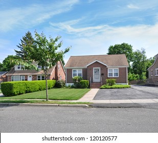 Suburban Bungalow Cottage Middle Class Home Sunny Blue Sky Day