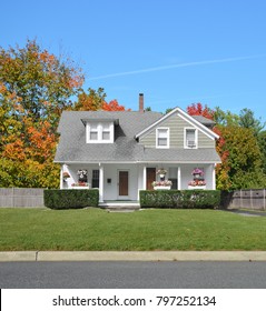 Suburban Cape Cod Home Autumn Trees Blue Sky USA