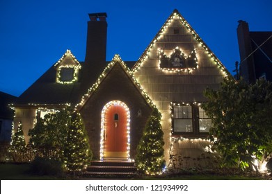 Suburban house decorated with lights for Christmas