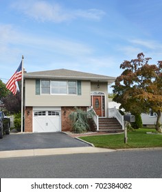 Suburban Split Level Home Blue Sky Clouds USA