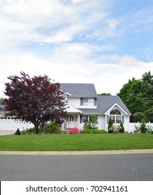 Suburban Split Level Home Blue Sky Clouds USA