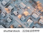 Suburban view from above with small houses and snow in Espoo, Finland