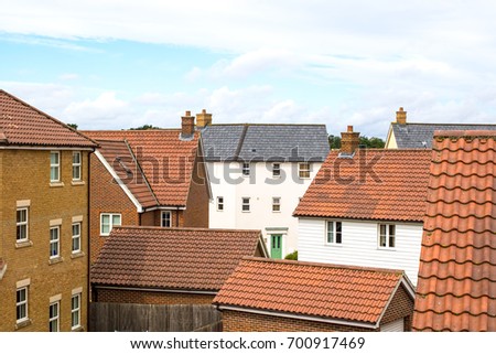 Suburbia. Houses on a modern suburban housing estate. Town living in various residential buildings.