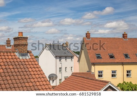 Suburbs. Roof top view of residential suburban housing estate. Mixed house buildings.