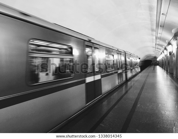 subway car in motion.\
black and white bw