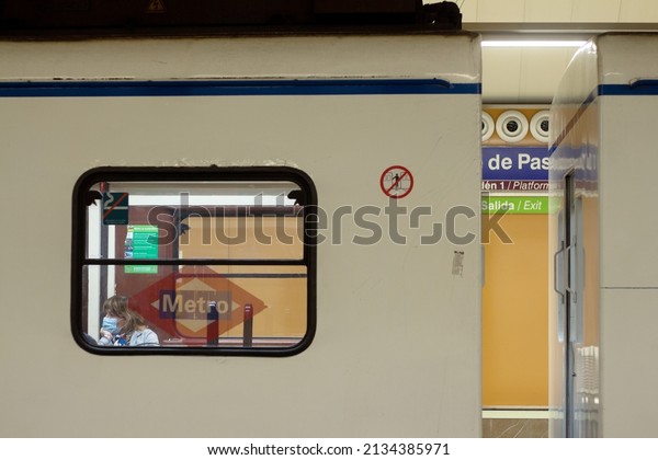 Subway car with a person wearing a mask on March 3,\
2022 in Madrid, Spain