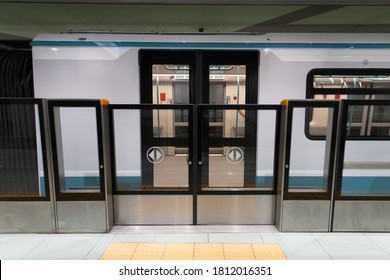 Subway Train, Empty At A Station. Platform Screen Doors Closed.