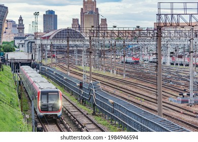 Subway train moves from the tunnel on railway station background. Moscow. Russia.