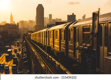 Subway Train in New York at Sunset - Shutterstock ID 215434102