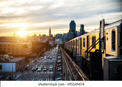 Subway train in New York at sunset and Manhattan cityscape view