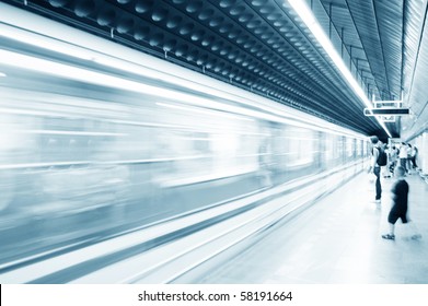 Subway train pulling into the station. Motion blur picture.