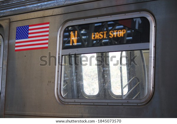 Subway window and last stop\
sign