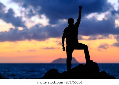 Success achievement running or hiking accomplishment business and motivation concept with man sunset silhouette celebrating arms up raised outstretched trekking climbing running outdoors in nature - Shutterstock ID 283755356