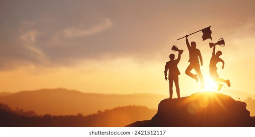 Success and achieving goals. Silhouette of businessman holding a trophy and flag on top of the mountain. concept of victory in competition Business and strategic planning for future business growth. - Powered by Shutterstock