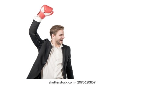 Success is born in fight. Happy businessman raise hand in boxing glove. Professional success