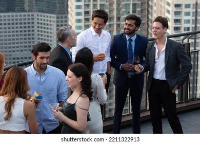 success business company team party at rooftop and celebration cheer team friendship celebration with happy group enjoy drinks - Powered by Shutterstock