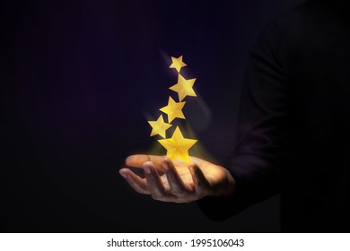 Success in Business or Personal Talent Concept. Gesture Hand with Golden Five Star Awards