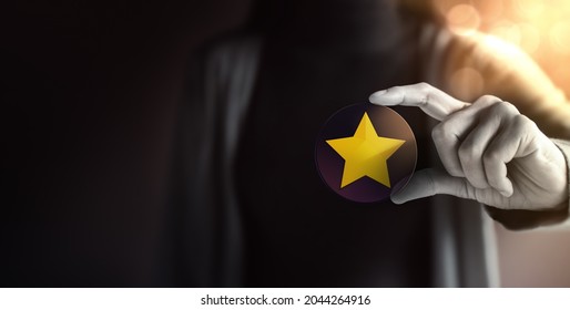 Success in Business or Personal Talent Concept. Young Employee Woman Holding a Golden Star - Shutterstock ID 2044264916