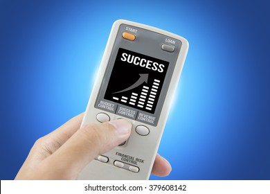 success business remote controller isolated on blue background, clipping path - Shutterstock ID 379608142