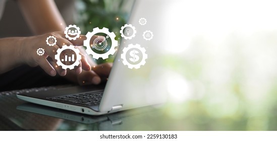 success and business target concept, project management, company strategy development in Cogs and gear wheel mechanisms concept.technology on virtual screen conceptimages - Powered by Shutterstock