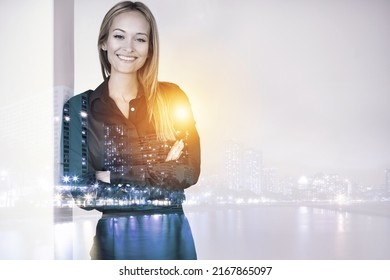 Success In The City. Multiple Exposure Portrait Of A Beautiful Woman Superimposed Over A City.