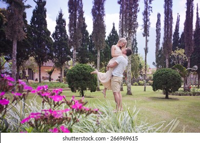 Success Couple At Balinese Botanical Garden