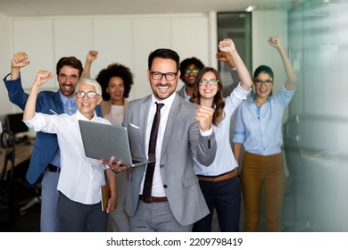Success group of multiethnic entrepreneurs and business people achieving goals in corporate office - Shutterstock ID 2209798419