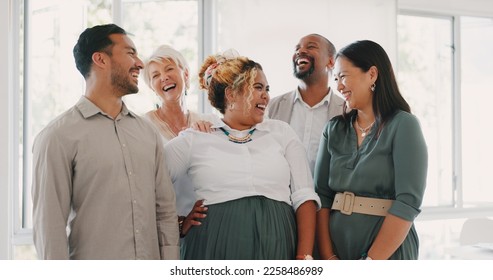 Success, happy or funny business people in an office building laughing at a funny joke after a group meeting. Diversity, comic or employees with big smiles bonding after a successful business deal - Shutterstock ID 2258486989