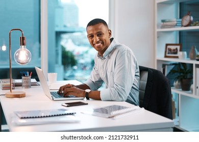 Success Is A Mentality. Portrait Of A Handsome Young Businessman Working On His Laptop During A Late Night Shift At Work.