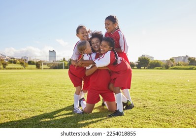 Success, soccer or winner children team hug in stadium for sports exercise, sport game or workout training. Teamwork, Canada or kids in celebrating fitness, wellness or health goal on football field - Powered by Shutterstock