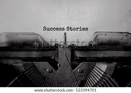 Success Stories typed words on a vintage typewriter