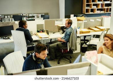 Success Is A Team Effort. Shot Of A Group Of Colleagues Working Together In An Office.