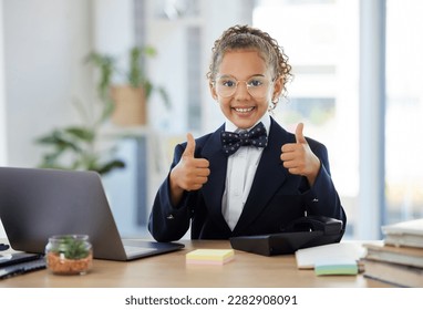 Success, winner and child with thumbs up on laptop for achievement, victory and office results. Business, education and young girl on computer with hand gesture smile, happy and excited for goals - Powered by Shutterstock