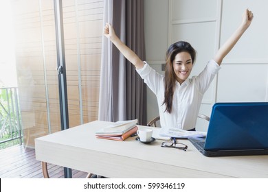 Successful Asian Business Woman Happy With Her Finished Work