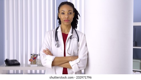 Successful Black Woman Doctor Standing In Office