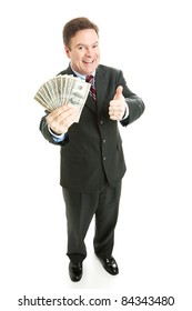 Successful businesman holding a wad of cash in hundred dollar bills.  Full body isolated on white.