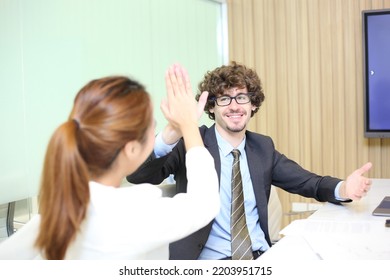  Successful Business Professionals. Happy Attractive Businessman 
Diverse Team Celebrating Business Success At Meeting. 