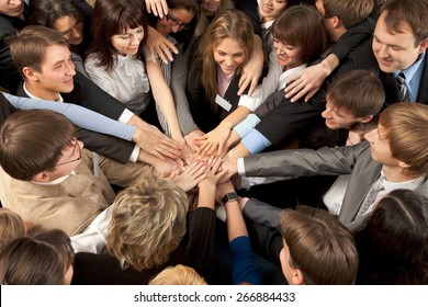 Successful Business Team Joining Hands Together