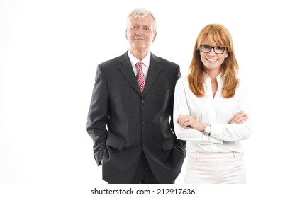 Successful Business Woman And Businessman Standing Against White Background. Sales Team.