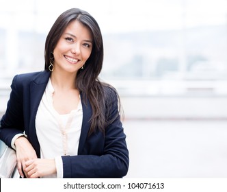 Successful Business Woman Looking Confident And Smiling